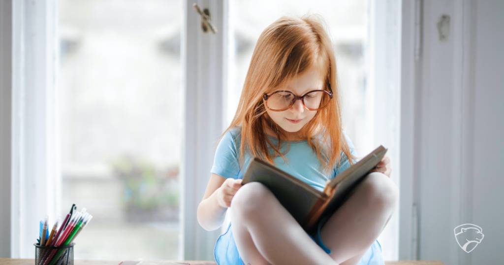 Girl reading a book.