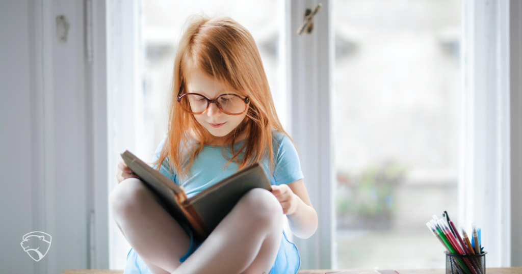 Girl reading a book.